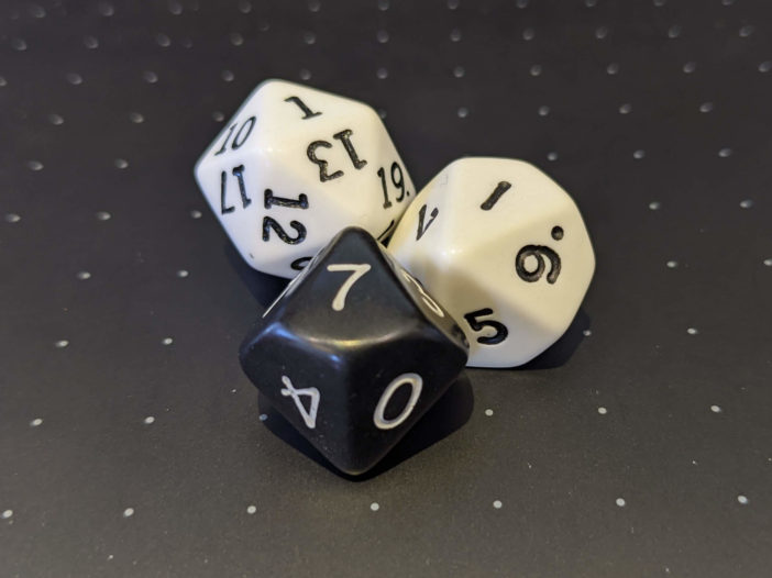 Two 10 sided dice and a 20 sided die.